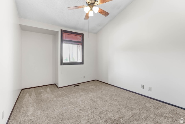 3574 E Kings Cove Way, Cottonwood Heights, UT 84121 - spare room with light colored carpet, a ceiling fan, and vaulted ceiling