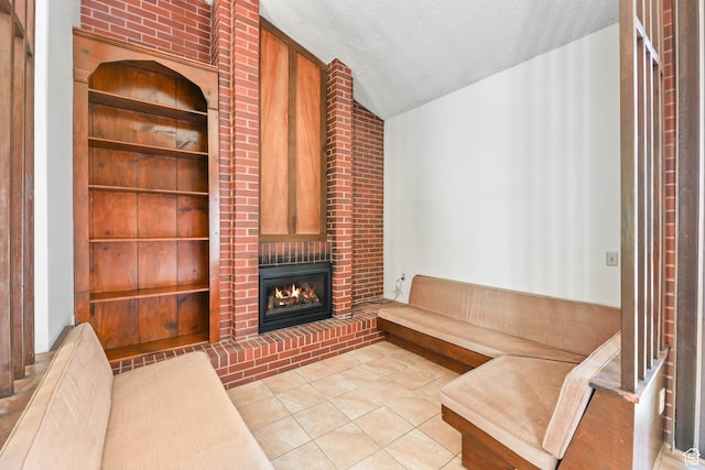 3574 E Kings Cove Way, Cottonwood Heights, UT 84121 - unfurnished living room with a fireplace, tile patterned flooring, a textured ceiling, and lofted ceiling