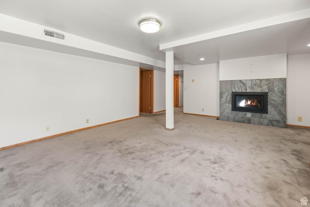 3574 E Kings Cove Way, Cottonwood Heights, UT 84121 - unfurnished living room featuring carpet flooring, a premium fireplace, and recessed lighting