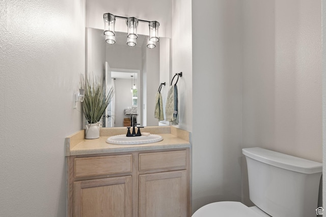 3584 S Autumn Gate Ct, Magna, UT 84044 - half bathroom with toilet and vanity