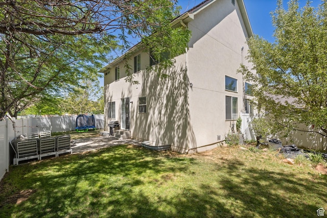 3584 S Autumn Gate Ct, Magna, UT 84044 - view of home's exterior featuring stucco siding and a fenced backyard