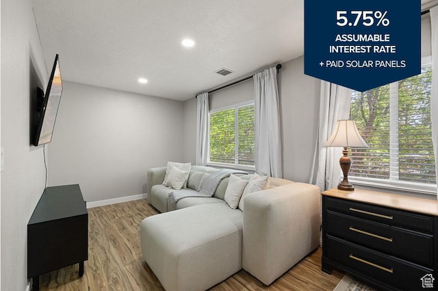 3584 S Autumn Gate Ct, Magna, UT 84044 - living area featuring light wood-type flooring and recessed lighting