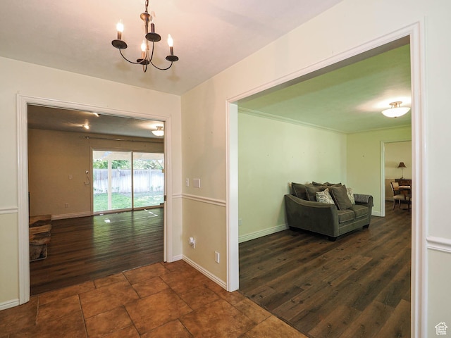 1473 E Millcreek Way, Millcreek, UT 84106 - hallway featuring a chandelier and dark wood-style flooring