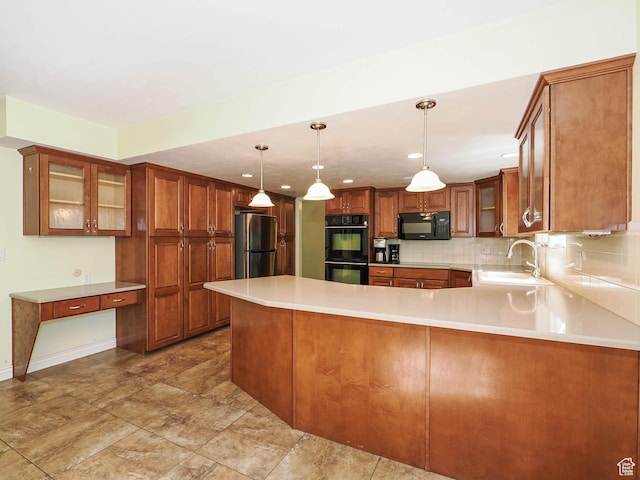 1473 E Millcreek Way, Millcreek, UT 84106 - kitchen with black appliances, light countertops, a peninsula, glass insert cabinets, and brown cabinets
