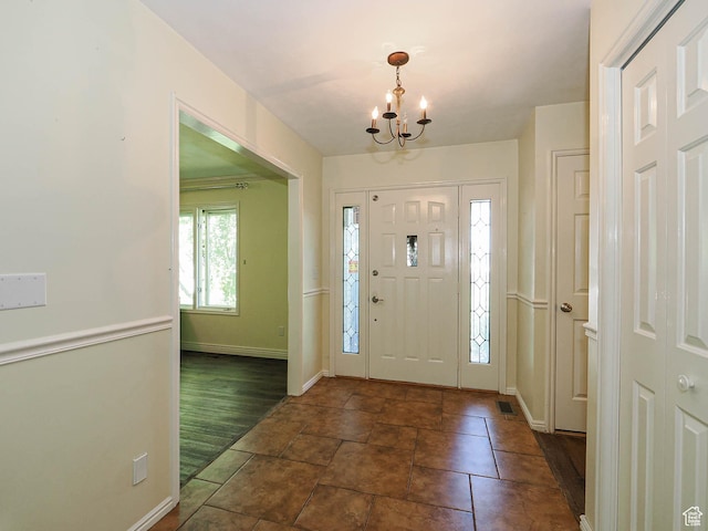 1473 E Millcreek Way, Millcreek, UT 84106 - foyer entrance with a chandelier and baseboards