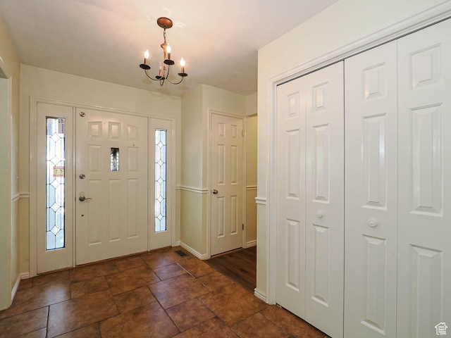 1473 E Millcreek Way, Millcreek, UT 84106 - entryway featuring a chandelier and baseboards