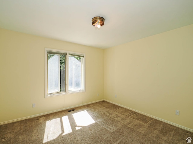 1473 E Millcreek Way, Millcreek, UT 84106 - spare room with carpet flooring and baseboards
