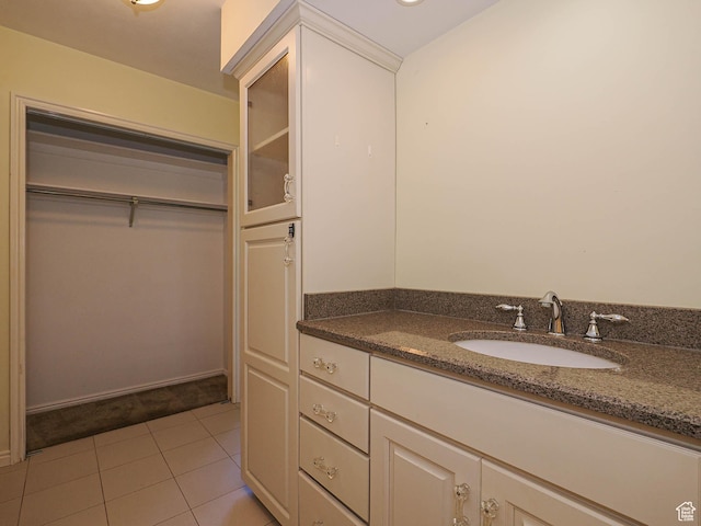 1473 E Millcreek Way, Millcreek, UT 84106 - bathroom featuring vanity, a spacious closet, and tile patterned floors