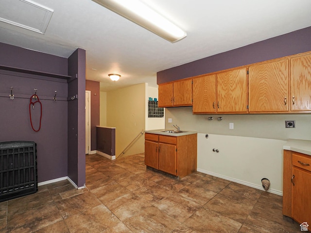1473 E Millcreek Way, Millcreek, UT 84106 - kitchen featuring brown cabinets and light countertops