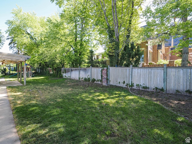 1473 E Millcreek Way, Millcreek, UT 84106 - fenced backyard with a playground