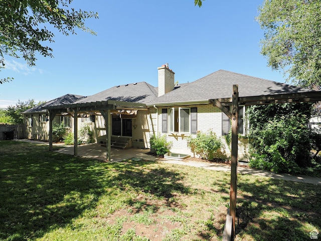 1473 E Millcreek Way, Millcreek, UT 84106 - back of property featuring a pergola, a patio, brick siding, a shingled roof, and a chimney