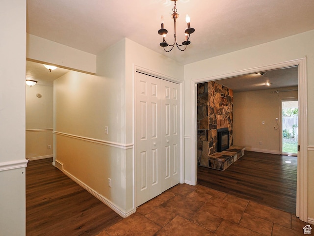 1473 E Millcreek Way, Millcreek, UT 84106 - hallway with wood finished floors and a chandelier