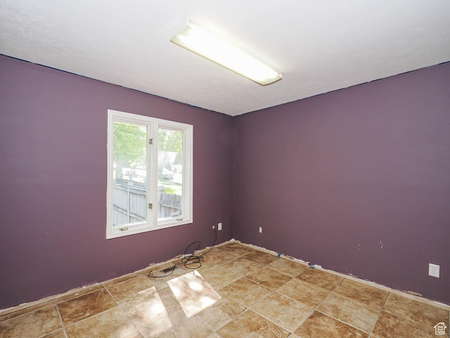 1473 E Millcreek Way, Millcreek, UT 84106 - spare room with light stone finish flooring