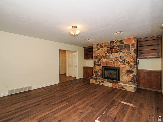 1473 E Millcreek Way, Millcreek, UT 84106 - unfurnished living room featuring wood finished floors and a fireplace