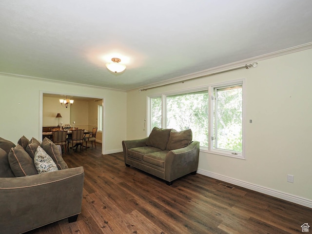 1473 E Millcreek Way, Millcreek, UT 84106 - living room with a chandelier, ornamental molding, and dark wood-style flooring