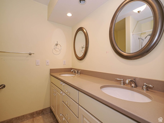 1473 E Millcreek Way, Millcreek, UT 84106 - bathroom featuring double vanity, tile patterned floors, and recessed lighting