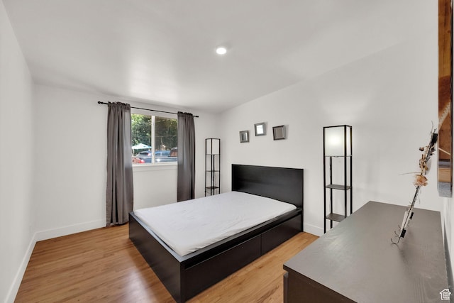 819 E 1100 N, Ogden, UT 84404 - bedroom featuring light wood-type flooring and recessed lighting