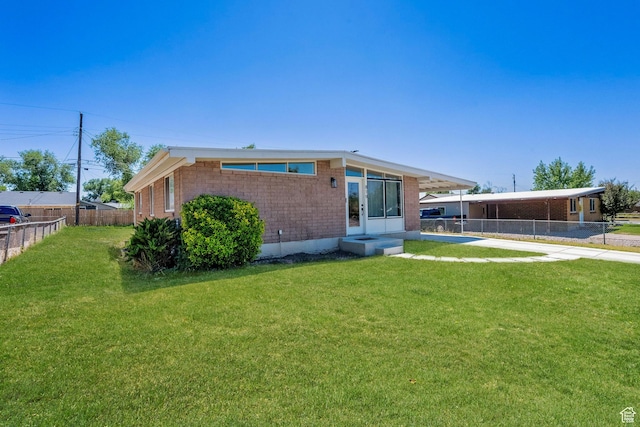 819 E 1100 N, Ogden, UT 84404 - rear view of house featuring brick siding