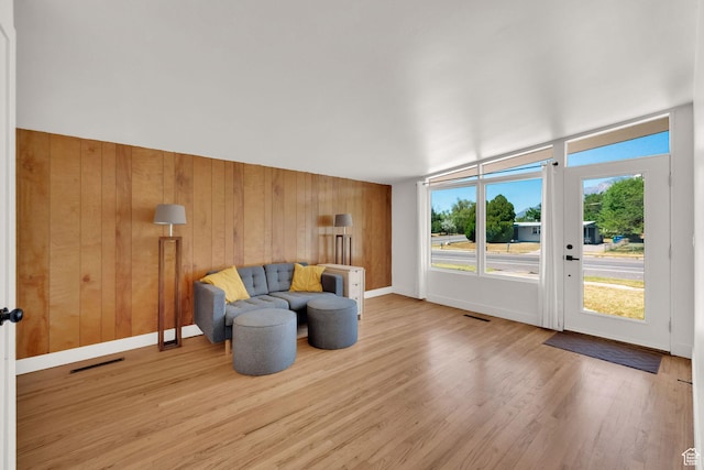 819 E 1100 N, Ogden, UT 84404 - sitting room with light wood finished floors and wood walls