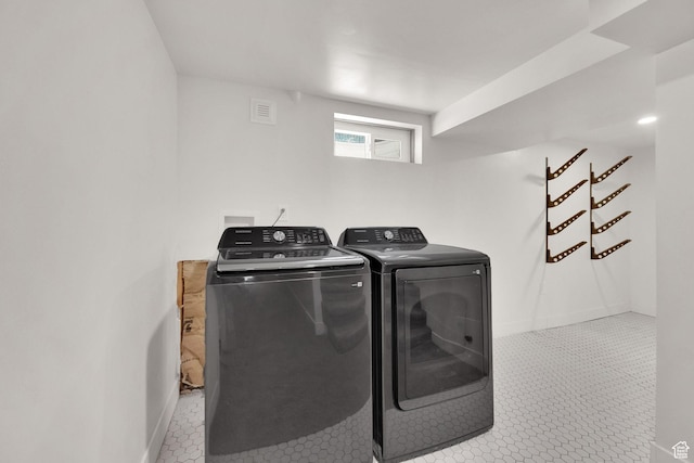 819 E 1100 N, Ogden, UT 84404 - laundry room with washer and clothes dryer and tile patterned floors