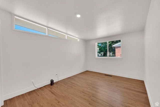 819 E 1100 N, Ogden, UT 84404 - spare room featuring wood finished floors, recessed lighting, and lofted ceiling