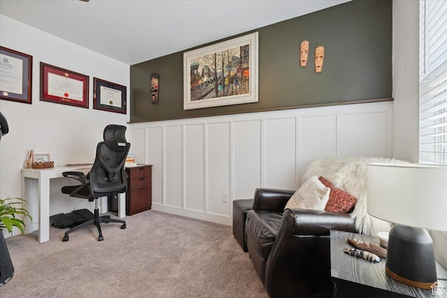 10606 S Redknife Dr, South Jordan, UT 84009 - office area featuring a decorative wall, wainscoting, and carpet floors