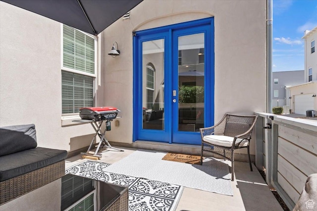 10606 S Redknife Dr, South Jordan, UT 84009 - doorway to property featuring french doors and stucco siding