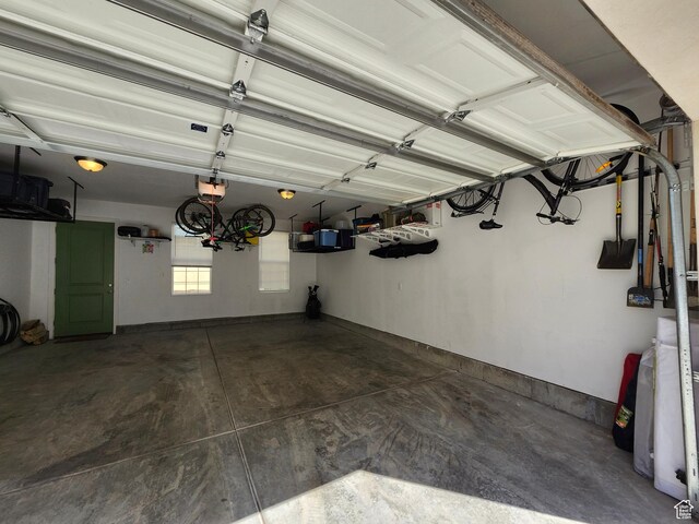 10606 S Redknife Dr, South Jordan, UT 84009 - garage featuring a garage door opener