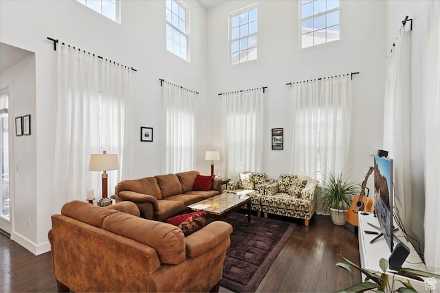 10606 S Redknife Dr, South Jordan, UT 84009 - living room featuring dark wood-style floors and a high ceiling
