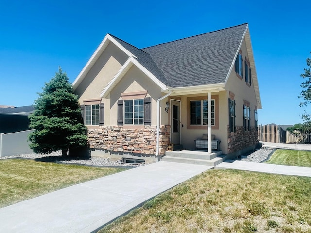908 W Timpie Rd S, Tooele, UT 84074 - ranch-style home with stone siding, stucco siding, and roof with shingles
