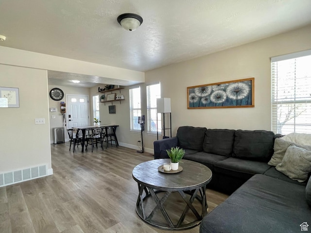 908 W Timpie Rd S, Tooele, UT 84074 - living area featuring wood finished floors and baseboards