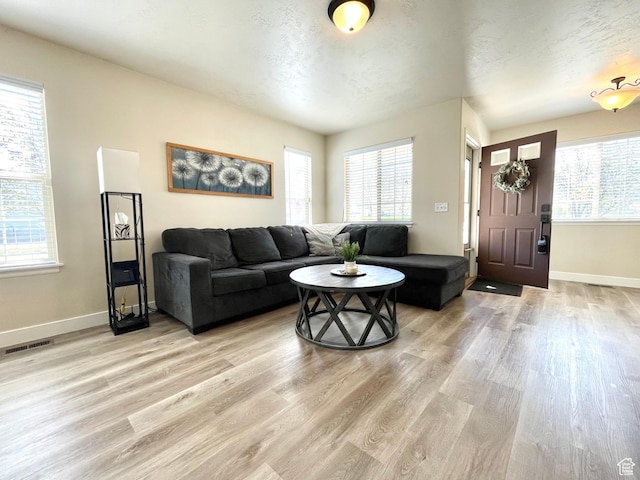 908 W Timpie Rd S, Tooele, UT 84074 - living area featuring light wood finished floors and baseboards