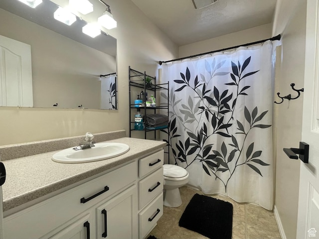 908 W Timpie Rd S, Tooele, UT 84074 - bathroom with vanity, a shower with shower curtain, and tile patterned flooring