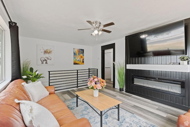 780 N 200 E, Spanish Fork, UT 84660 - living room featuring ceiling fan, wood finished floors, and a glass covered fireplace