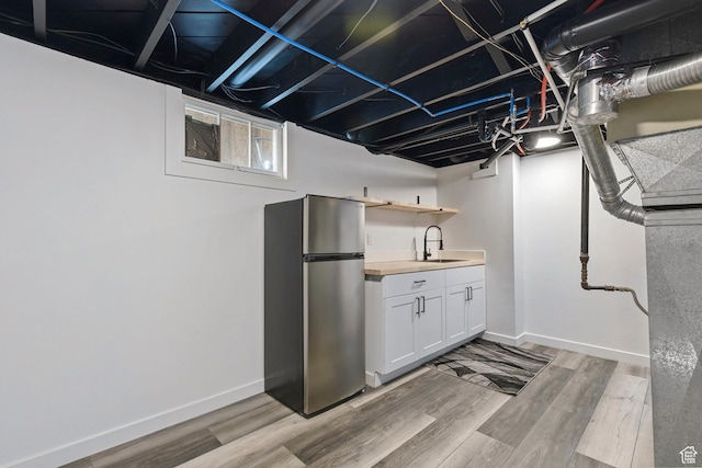 780 N 200 E, Spanish Fork, UT 84660 - finished below grade area featuring freestanding refrigerator, wet bar, and light wood finished floors