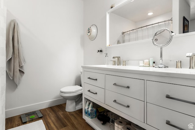 48 E Cedar Ln, Malad City, ID 83252 - bathroom with double vanity and wood finished floors