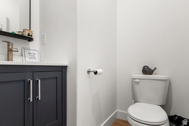 48 E Cedar Ln, Malad City, ID 83252 - half bath featuring vanity and wood finished floors