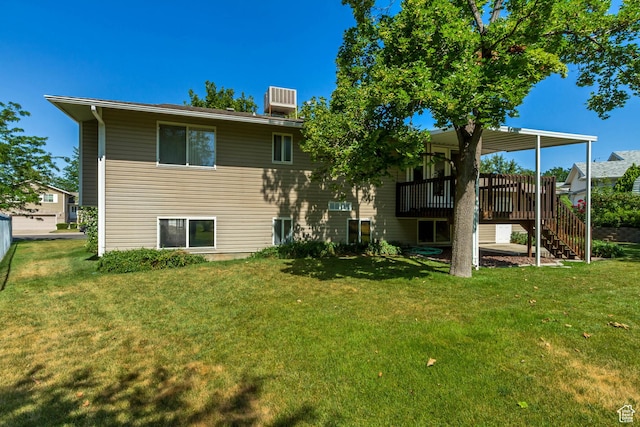 2386 N 725 W, Layton, UT 84041 - rear view of house featuring stairway, a yard, and a deck