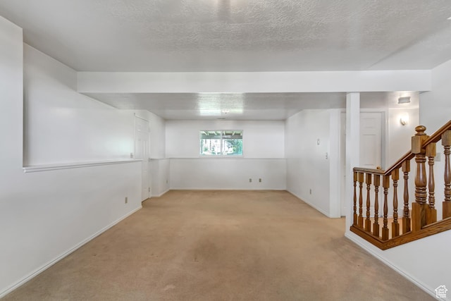 2386 N 725 W, Layton, UT 84041 - spare room with light carpet, a textured ceiling, and stairway