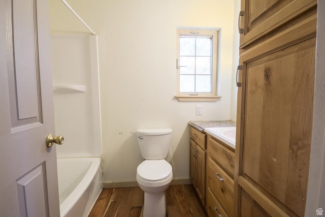 168 S 100 W, Roosevelt, UT 84066 - full bath with vanity, wood finished floors, and shower / bath combination