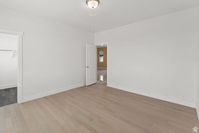 2886 N Desert Forest Ln, Lehi, UT 84043 - empty room with light wood-style flooring and baseboards