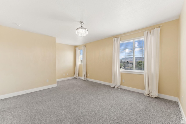 2886 N Desert Forest Ln, Lehi, UT 84043 - empty room with carpet floors and healthy amount of natural light