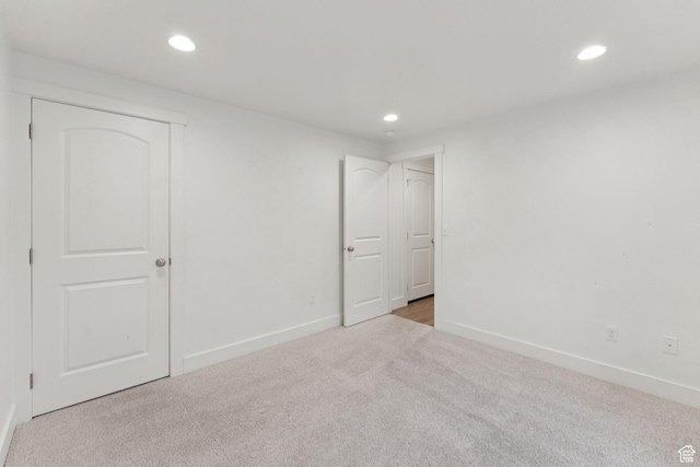 2886 N Desert Forest Ln, Lehi, UT 84043 - unfurnished bedroom featuring carpet, recessed lighting, and a closet