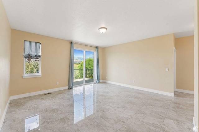 2886 N Desert Forest Ln, Lehi, UT 84043 - spare room with light tile patterned flooring and baseboards