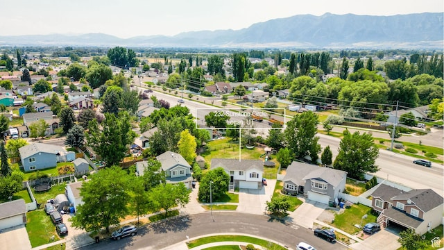 232 Sunstone Cir W, Logan, UT 84321 - aerial perspective of suburban area with mountains
