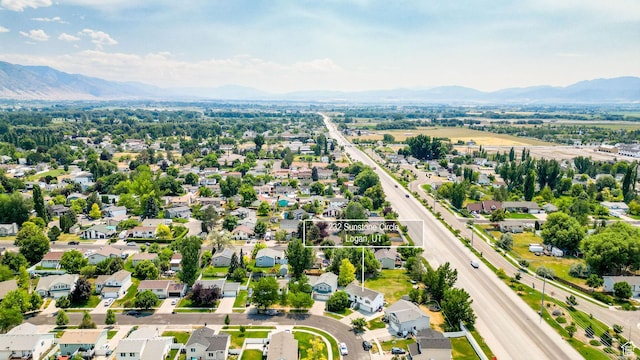 232 Sunstone Cir W, Logan, UT 84321 - aerial view of residential area featuring a mountain backdrop
