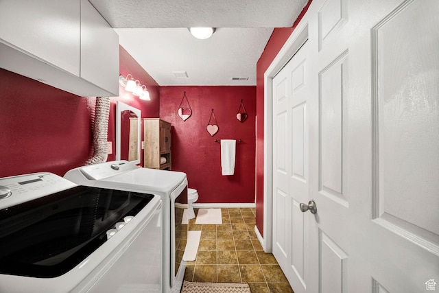 232 Sunstone Cir W, Logan, UT 84321 - full bath featuring washer and clothes dryer and a textured ceiling