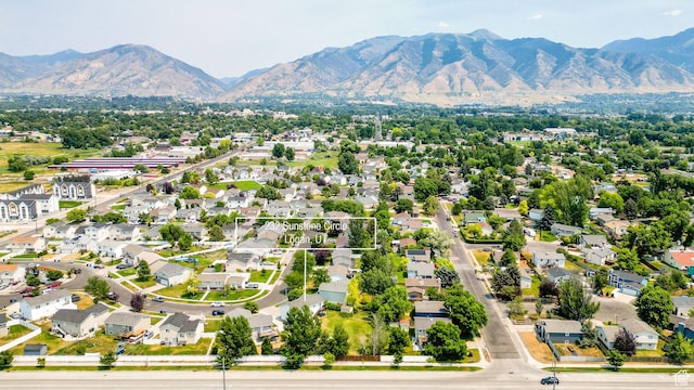 232 Sunstone Cir W, Logan, UT 84321 - aerial perspective of suburban area featuring mountains
