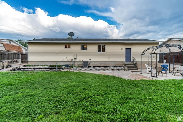 6074 W Wending Ln, West Valley City, UT 84128 - rear view of property with entry steps, a patio area, and a gazebo