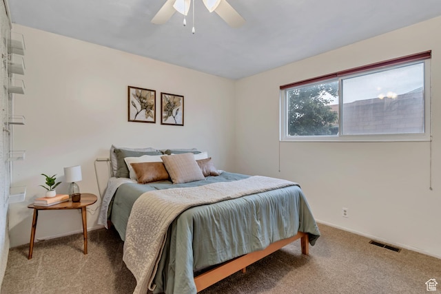 6074 W Wending Ln, West Valley City, UT 84128 - carpeted bedroom featuring baseboards and ceiling fan